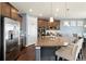 Modern kitchen with stainless steel appliances and island at 7800 E 148Th Dr, Thornton, CO 80602