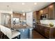 Modern kitchen with stainless steel appliances and island at 7800 E 148Th Dr, Thornton, CO 80602