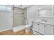 Basement bathroom with a walk-in shower and modern vanity at 740 Fulton Ave, Fort Lupton, CO 80621