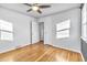 Bright bedroom with hardwood floors and ceiling fan at 740 Fulton Ave, Fort Lupton, CO 80621