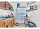 Small kitchen with wood cabinets and essential appliances at 740 Fulton Ave, Fort Lupton, CO 80621