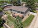 Aerial view of a home featuring a deck and landscaped yard at 2155 S Deframe St, Lakewood, CO 80228