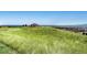 Community hilltop vista point with a gazebo overlooking plains and the Denver city scape at 2155 S Deframe St, Lakewood, CO 80228