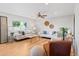 Spacious and comfortable living room with hardwood floors and ample natural light at 2155 S Deframe St, Lakewood, CO 80228