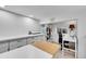 Bright craft room with plenty of counter space and a sewing area for hobbies and projects at 12408 W 83Rd Ave, Arvada, CO 80005