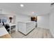 Spacious craft room featuring a large island, workstation, and ample storage at 12408 W 83Rd Ave, Arvada, CO 80005