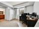 Spacious home office with wardrobe, natural light, and a comfortable workspace at 12408 W 83Rd Ave, Arvada, CO 80005