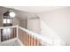 Finished attic space featuring hardwood floors, closet, and a window at 136 W Maple Ave, Denver, CO 80223