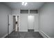 Bedroom featuring gray carpet, a ceiling fan, and an open door to the hallway at 136 W Maple Ave, Denver, CO 80223