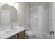 Bathroom featuring vanity sink, toilet, and shower-tub combination at 6900 W Grant Ranch Blvd # 88, Denver, CO 80123
