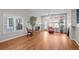 Spacious living room with hardwood floors, fireplace, and lots of natural light at 6900 W Grant Ranch Blvd # 88, Denver, CO 80123