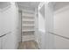 Organized walk-in closet with built-in shelving and drawers at 6900 W Grant Ranch Blvd # 88, Denver, CO 80123
