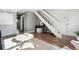 Inviting living room with wood flooring and neutral color scheme at 2105 Coronado Pkwy # C, Denver, CO 80229