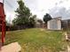 Spacious backyard with storage shed and grassy area at 17968 E Bethany Pl, Aurora, CO 80013