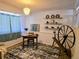 Finished basement room with rug and antique spinning wheel at 17968 E Bethany Pl, Aurora, CO 80013