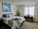 Main bedroom with large window and ample closet space at 17968 E Bethany Pl, Aurora, CO 80013