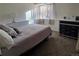 Bright bedroom with a double bed and ample storage at 17968 E Bethany Pl, Aurora, CO 80013