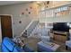 Living area with loft and staircase at 17968 E Bethany Pl, Aurora, CO 80013