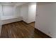Basement with laminate floors, white walls and window seating at 34480 County Road 17, Elizabeth, CO 80107