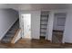 View of the basement featuring neutral carpet, stairs, closet and doorway at 34480 County Road 17, Elizabeth, CO 80107