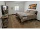 Cozy bedroom with a comfortable queen bed, soft carpet, and a relaxing ambiance at 34480 County Road 17, Elizabeth, CO 80107