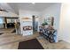 Inviting entryway with a bench, decorative table with mirror, and wood look vinyl flooring at 34480 County Road 17, Elizabeth, CO 80107