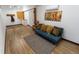 Inviting living room with hardwood floors, a comfortable couch, and stylish decor at 34480 County Road 17, Elizabeth, CO 80107
