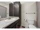 Bathroom with single vanity and shower at 12886 Jasmine St # B, Thornton, CO 80602