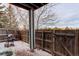 Enclosed patio with fencing providing privacy, a grill for entertaining, and a view of the surrounding landscape at 2855 Rock Creek Cir # 129, Superior, CO 80027