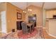 Dining room featuring a chandelier, wood table and chairs, and a decorative rug at 2855 Rock Creek Cir # 129, Superior, CO 80027