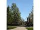 Community playground with slide and trees, providing a fun and safe environment for children to play at 2855 Rock Creek Cir # 129, Superior, CO 80027