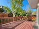 Enjoy outdoor living on this spacious wood back deck with an inviting backyard view at 16212 Blueleaf Pl, Parker, CO 80134