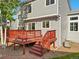 A two-level wood back deck offers plenty of room for grilling and outdoor fun at 16212 Blueleaf Pl, Parker, CO 80134