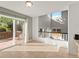 Bright breakfast nook with sliding glass doors to the outside deck at 16212 Blueleaf Pl, Parker, CO 80134