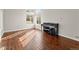 Bright living room with hardwood floors and plenty of natural light at 16212 Blueleaf Pl, Parker, CO 80134