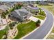 An aerial view shows the home's landscaping, large yard, and quiet cul-de-sac location at 5439 Innisbrook Loop, Elizabeth, CO 80107