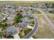 Aerial shot showcasing a neighborhood with manicured lawns and landscaped yards at 5439 Innisbrook Loop, Elizabeth, CO 80107