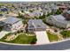 An aerial view showcases this home in a neighborhood with well-kept lawns and landscaping at 5439 Innisbrook Loop, Elizabeth, CO 80107