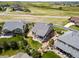 An aerial view highlights the home's lush landscaping, private backyard, and scenic surroundings at 5439 Innisbrook Loop, Elizabeth, CO 80107