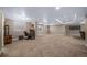 Large finished basement offering versatile space for recreation and home office setup at 5439 Innisbrook Loop, Elizabeth, CO 80107