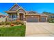 Beautiful home featuring stone accents and a three-car garage in a lovely neighborhood at 5439 Innisbrook Loop, Elizabeth, CO 80107