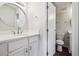 Second bathroom boasts stylish mirror, and elegant vanity at 4273 S Salida Way # 1, Aurora, CO 80013