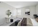 Cozy bedroom featuring neutral decor, soft carpeting, and a stylish vanity area at 4273 S Salida Way # 1, Aurora, CO 80013