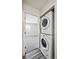 Convenient in-unit laundry area with a stacked washer and dryer set at 4273 S Salida Way # 1, Aurora, CO 80013