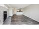 Bright living room with an open floor plan that leads to a modern kitchen at 4273 S Salida Way # 1, Aurora, CO 80013