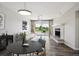 Bright living room featuring modern decor, fireplace, and a large window for natural light and scenic views at 4273 S Salida Way # 1, Aurora, CO 80013