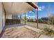 Outdoor patio area with partial roof providing an area to relax at 7140 S Reed Ct, Littleton, CO 80128