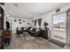 Cozy living room with wood floors, recessed lighting, and comfortable seating at 1882 S Stuart St, Denver, CO 80219