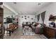 Inviting living room featuring wood floors, recessed lighting, and comfortable seating at 1882 S Stuart St, Denver, CO 80219