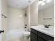 This full bathroom includes a shower and bathtub, tile surround and a black vanity for your personal needs at 41 Garner Ln, Erie, CO 80516